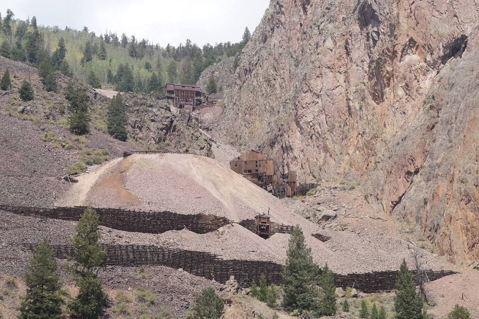 Mine tailings and old timber workings on a hillside along the Bachelor Loop