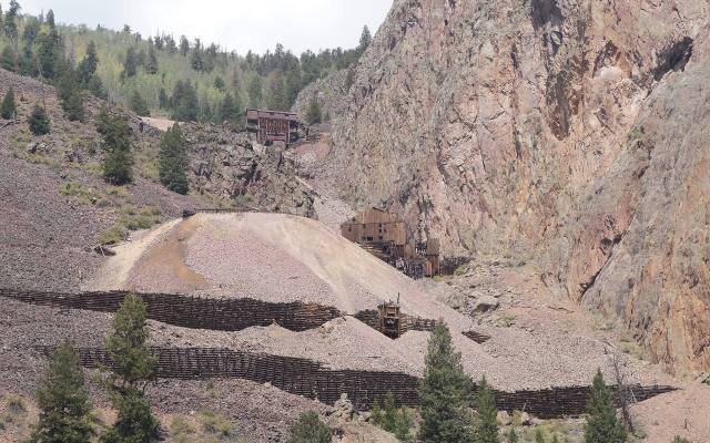 Mine tailings and old timber workings on a hillside along the Bachelor Loop