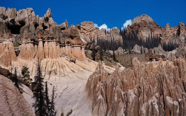 Pale spires and ridges of eroded volcanic tuff in the Wheeler Geologic Area