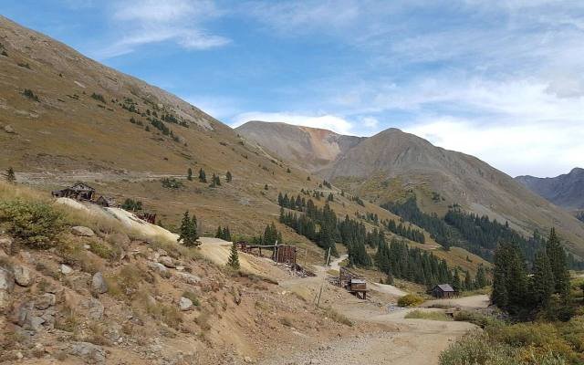 Old mine buildings at Animas Forks below the road to Cinnamon Pass